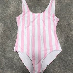 Pink and white striped one piece swimsuit